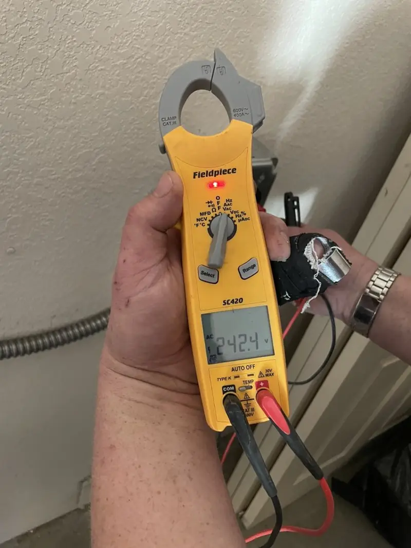 Voltage testing with clamp meter during Outlet Installation in Cheraw